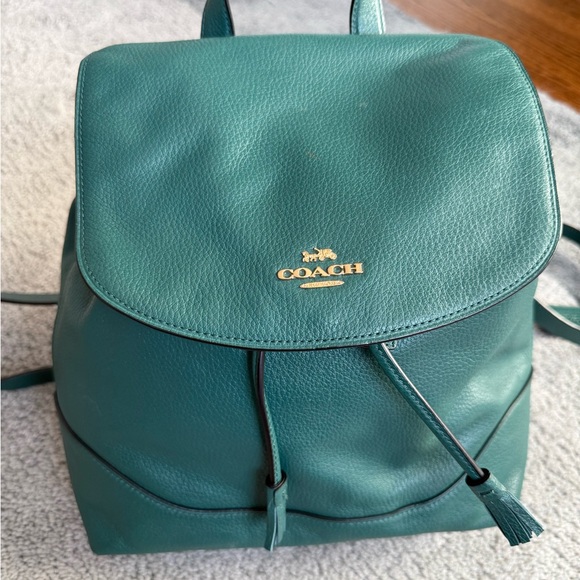 coach dark green leather backpack 2018 Outlet Warner Soft pebble leather Inside zip cell phone and multifunction pockets Inside laptop sleeve with secure tab Magnetic snap and drawstring closures fabric lining Top handle with 3 1/4 drop Fits a 15 laptop Outside zip pockets Adjustable shoulder straps Luggage sleeve 10 1/4 (L) x 15 1/4 (H) x 5 (W) Style No. COACH Track Leather Backpack with